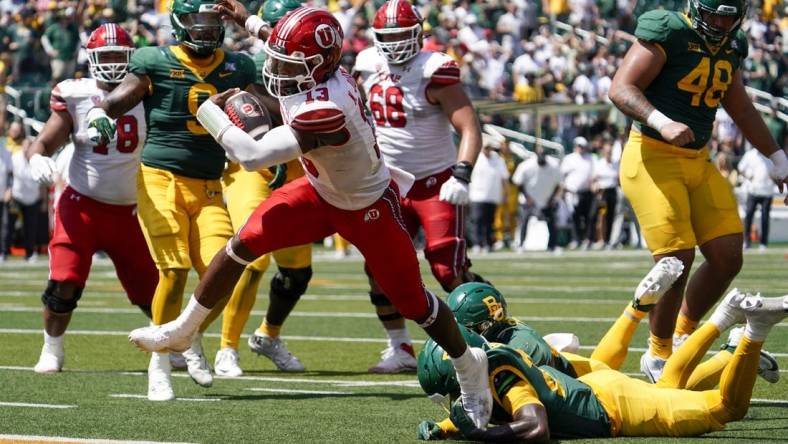 Sep 9, 2023; Waco, Texas, USA; Utah Utes quarterback Nate Johnson (13) carries the ball for a 11-yard touchdown against the Baylor Bears during the second half at McLane Stadium. Mandatory Credit: Raymond Carlin III-USA TODAY Sports