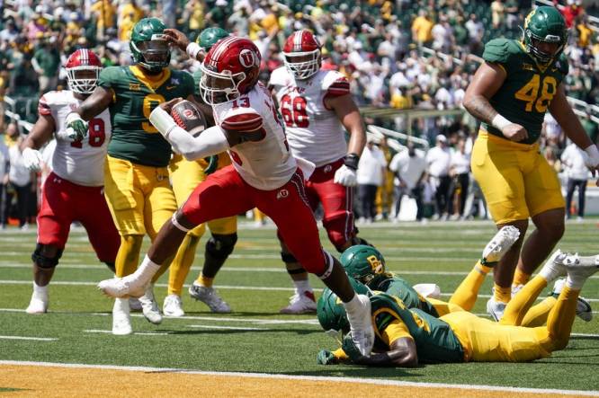 Sep 9, 2023; Waco, Texas, USA; Utah Utes quarterback Nate Johnson (13) carries the ball for a 11-yard touchdown against the Baylor Bears during the second half at McLane Stadium. Mandatory Credit: Raymond Carlin III-USA TODAY Sports