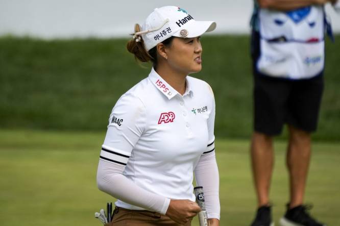 Sep 9, 2023; Cincinnati, Ohio, USA; Minjee Lee, of Perth, Australia, pumps her fist after putting for par on the 18th hole at the 2023 Kroger Queen City Championship presented by P&G at Kenwood Country Club in Madeira, Ohio. Mandatory Credit: Carter Skaggs-USA TODAY Sports