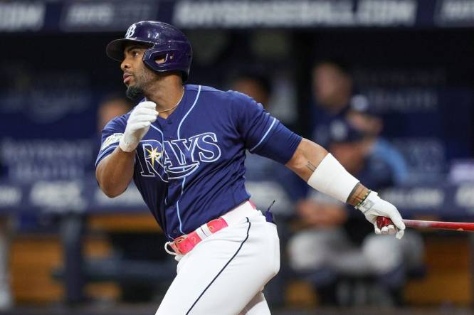 Sep 9, 2023; St. Petersburg, Florida, USA;  Tampa Bay Rays first baseman Yandy Diaz (2) hits an rbi double against the Seattle Mariners in the seventh inning at Tropicana Field. Mandatory Credit: Nathan Ray Seebeck-USA TODAY Sports