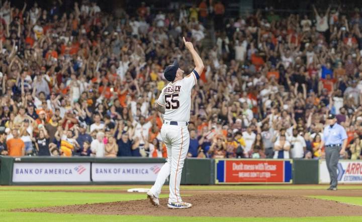 Sep 9, 2023; Houston, Texas, USA; Houston Astros relief pitcher Ryan Pressly (55) celebrates the win after defeating the San Diego Padres at Minute Maid Park. Mandatory Credit: Thomas Shea-USA TODAY Sports