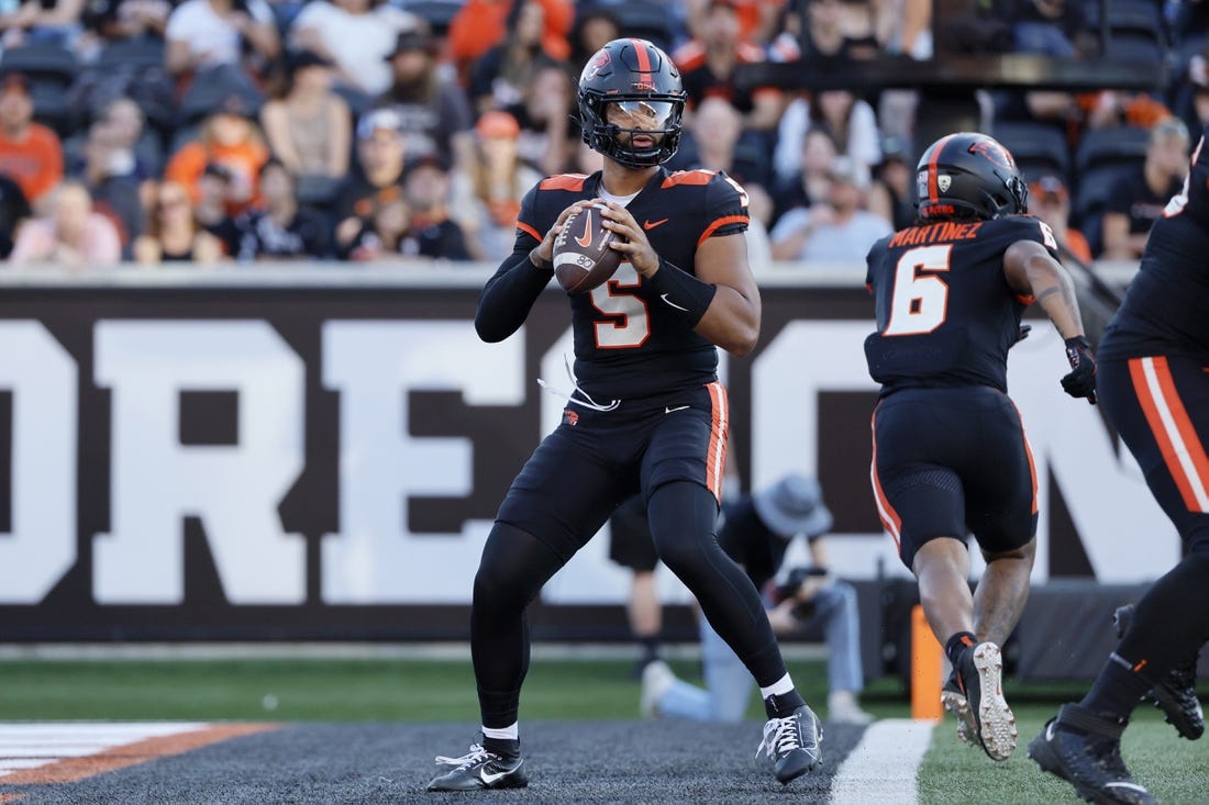 Sep 9, 2023; Corvallis, Oregon, USA; Oregon State Beavers quarterback DJ Uiagalelei (5) looks to throw during the first half against the UC Davis Aggies at Reser Stadium. Mandatory Credit: Soobum Im-USA TODAY Sports