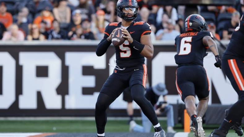 Sep 9, 2023; Corvallis, Oregon, USA; Oregon State Beavers quarterback DJ Uiagalelei (5) looks to throw during the first half against the UC Davis Aggies at Reser Stadium. Mandatory Credit: Soobum Im-USA TODAY Sports