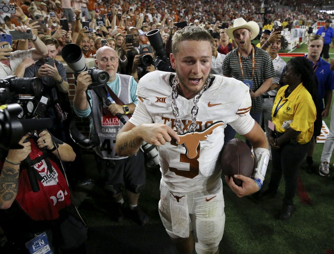 Sep 9, 2023; Tuscaloosa, Alabama, USA;  Texas Longhorns quarterback Quinn Ewers (3) celebrates after the win over Alabama Crimson Tide at Bryant-Denny Stadium. Texas defeated Alabama 34-24. Mandatory Credit: Gary Cosby Jr. -USA TODAY Sports