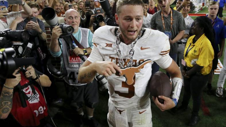 Sep 9, 2023; Tuscaloosa, Alabama, USA;  Texas Longhorns quarterback Quinn Ewers (3) celebrates after the win over Alabama Crimson Tide at Bryant-Denny Stadium. Texas defeated Alabama 34-24. Mandatory Credit: Gary Cosby Jr. -USA TODAY Sports