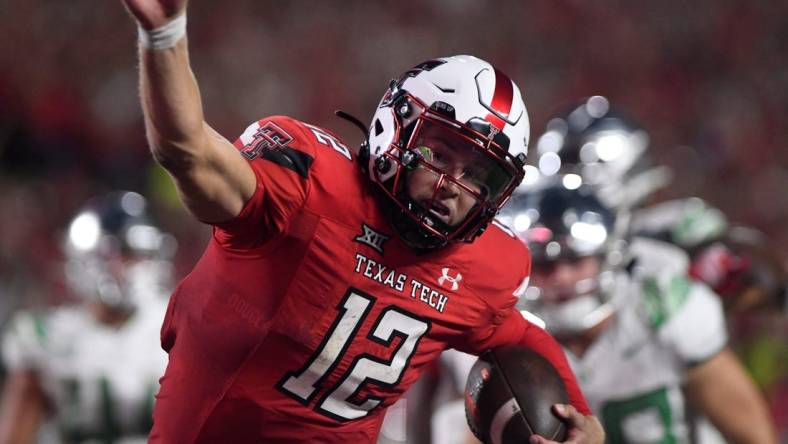Texas Tech's quarterback Tyler Shough (12) scores a touchdown against Oregon in a non-conference football game, Saturday, Sept. 9, 2023, at Jones AT&T Stadium.