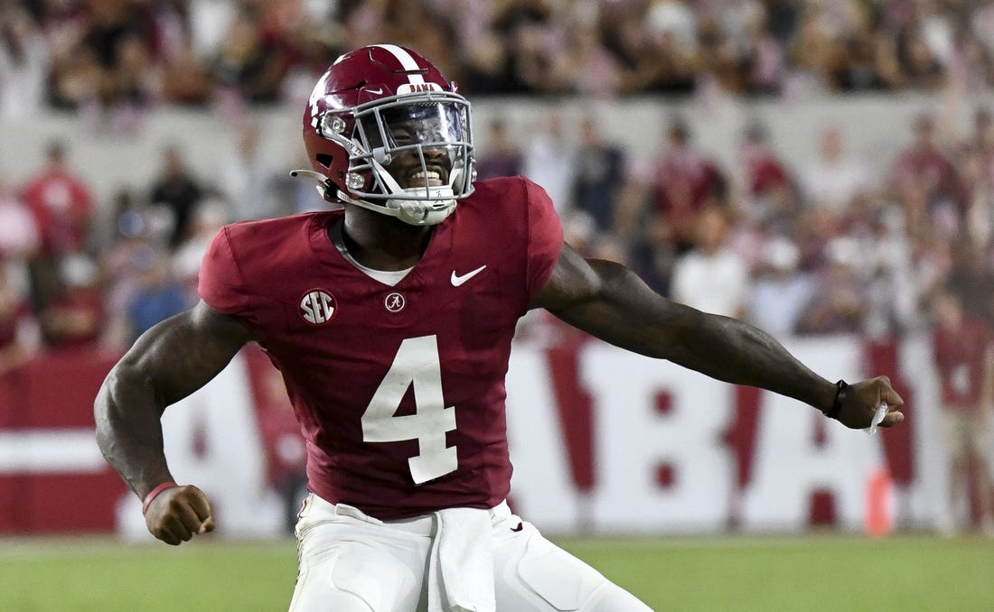 Sep 9, 2023; Tuscaloosa, Alabama, USA;  Alabama Crimson Tide quarterback Jalen Milroe (4) celebrates after hitting Alabama Crimson Tide wide receiver Jermaine Burton (3) for a touchdown at Bryant-Denny Stadium. Texas defeated Alabama 34-24. Mandatory Credit: Gary Cosby Jr. -USA TODAY Sports