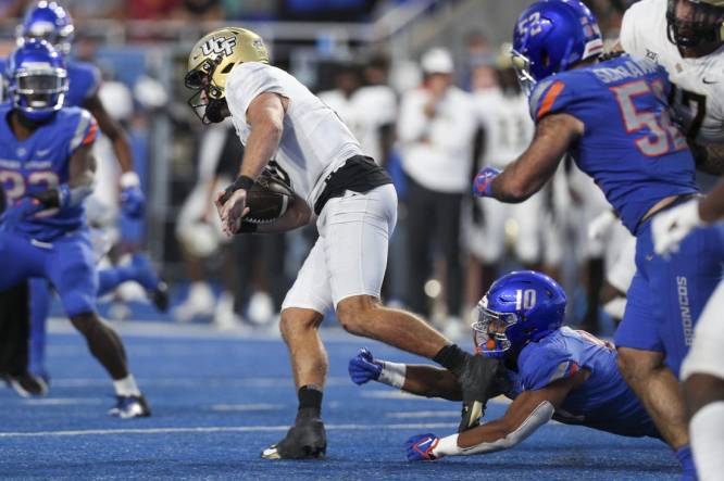 Sep 9, 2023; Boise, Idaho, USA; UCF Knights quarterback John Rhys Plumlee (10) during the second half of play versus the Boise State Broncos at Albertsons Stadium. UCF beats Boise State 18-16. Mandatory Credit: Brian Losness-USA TODAY Sports
