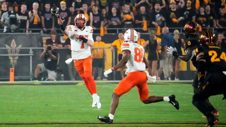 Sep 9, 2023; Tempe, Arizona, USA; Oklahoma State Cowboys quarterback Alan Bowman (7) throws a to wide receiver Brennan Presley (80) against the Arizona State Sun Devils in the first half at Mountain America Stadium. Mandatory Credit: Rob Schumacher-Arizona Republic