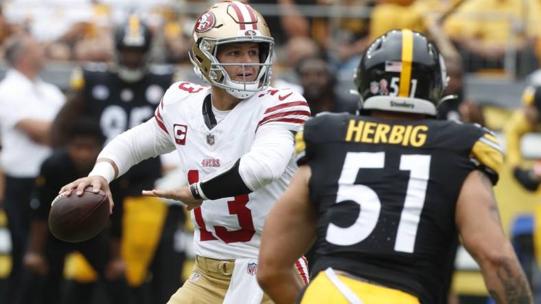 Sep 10, 2023; Pittsburgh, Pennsylvania, USA;  San Francisco 49ers quarterback Brock Purdy (13) passes against the Pittsburgh Steelers during the first quarter at Acrisure Stadium. Mandatory Credit: Charles LeClaire-USA TODAY Sports