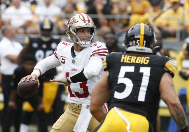 Sep 10, 2023; Pittsburgh, Pennsylvania, USA;  San Francisco 49ers quarterback Brock Purdy (13) passes against the Pittsburgh Steelers during the first quarter at Acrisure Stadium. Mandatory Credit: Charles LeClaire-USA TODAY Sports