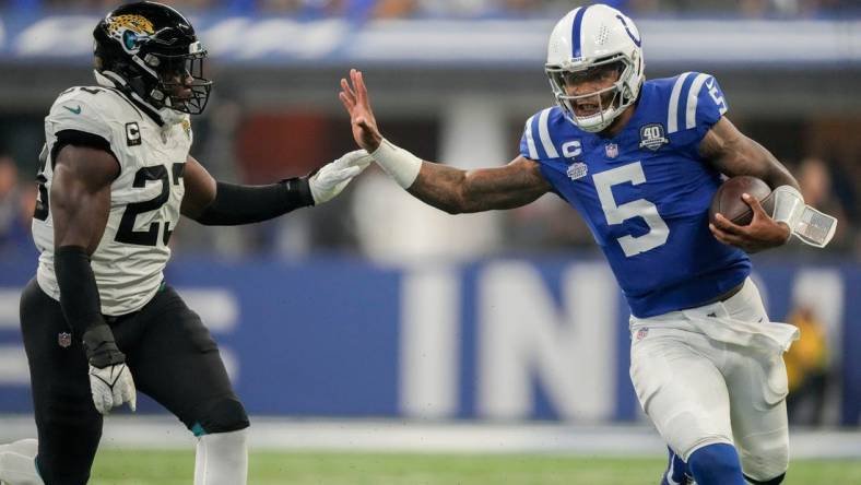 Jacksonville Jaguars linebacker Foyesade Oluokun (23) chases after Indianapolis Colts quarterback Anthony Richardson (5) as he rushes the ball Sunday, Sept. 10, 2023, during a game against the Jacksonville Jaguars at Lucas Oil Stadium in Indianapolis.