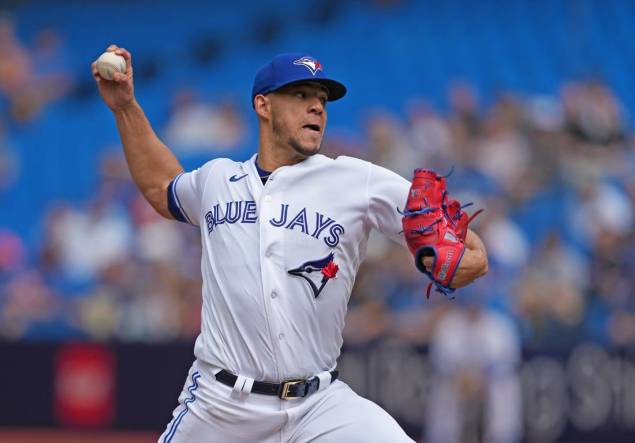 Sep 10, 2023; Toronto, Ontario, CAN; Toronto Blue Jays starting pitcher Jose Berrios (17) throws a pitch against the Kansas City Royals during the first inning at Rogers Centre. Mandatory Credit: Nick Turchiaro-USA TODAY Sports
