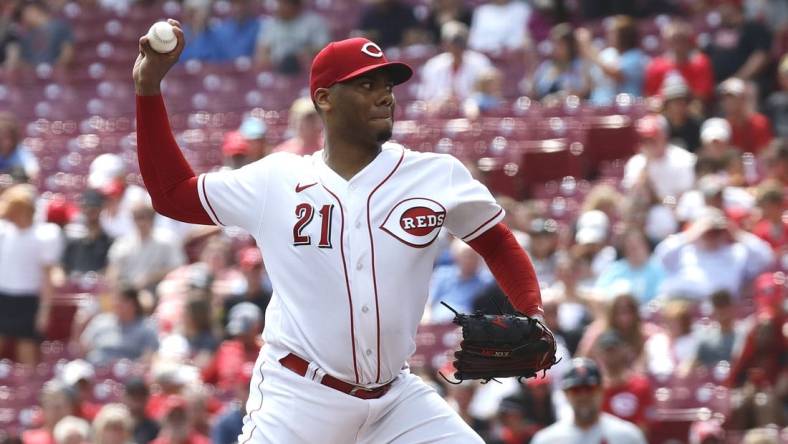 Sep 10, 2023; Cincinnati, Ohio, USA; Cincinnati Reds starting pitcher Hunter Greene (21) throws against the St. Louis Cardinals during the first inning at Great American Ball Park. Mandatory Credit: David Kohl-USA TODAY Sports