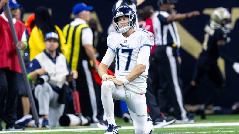 Sep 10, 2023; New Orleans, Louisiana, USA;  Tennessee Titans quarterback Ryan Tannehill (17) reacts to being tackled by the New Orleans Saints during the first half at the Caesars Superdome. Mandatory Credit: Stephen Lew-USA TODAY Sports