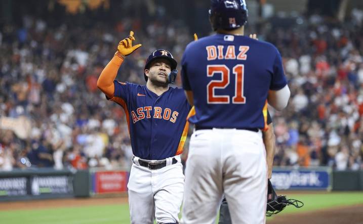 Sep 10, 2023; Houston, Texas, USA; Houston Astros second baseman Jose Altuve (27) celebrates after hitting a home run during the third inning against the San Diego Padres at Minute Maid Park. Mandatory Credit: Troy Taormina-USA TODAY Sports