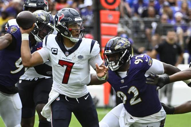 Sep 10, 2023; Baltimore, Maryland, USA; Houston Texans quarterback C.J. Stroud (7) attempts a pass as Baltimore Ravens defensive tackle Rayshad Nichols (91) rushes during the second half at M&T Bank Stadium. Mandatory Credit: Brad Mills-USA TODAY Sports