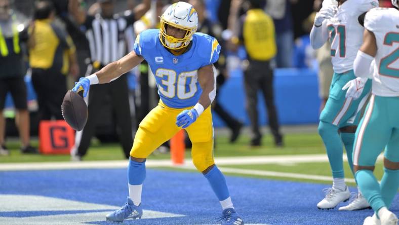 Sep 10, 2023; Inglewood, California, USA; Los Angeles Chargers running back Austin Ekeler (30) celebrates after a touchdown in the first half against the Miami Dolphins at SoFi Stadium. Mandatory Credit: Jayne Kamin-Oncea-USA TODAY Sports