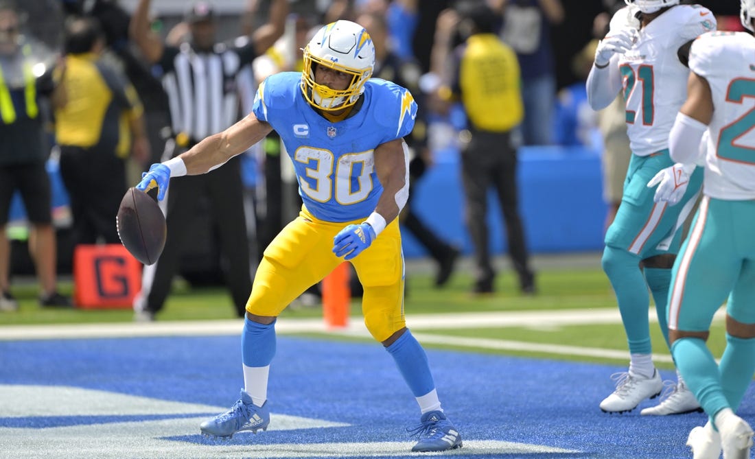 Sep 10, 2023; Inglewood, California, USA; Los Angeles Chargers running back Austin Ekeler (30) celebrates after a touchdown in the first half against the Miami Dolphins at SoFi Stadium. Mandatory Credit: Jayne Kamin-Oncea-USA TODAY Sports