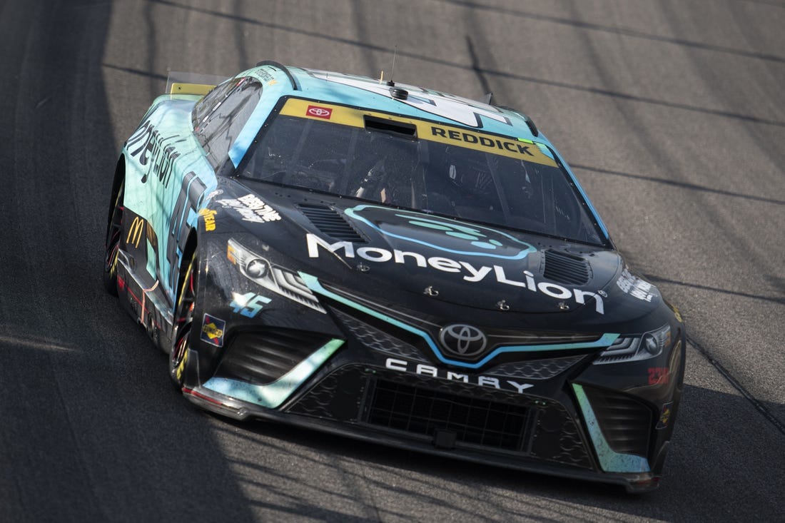 Sep 10, 2023; Kansas City, Kansas, USA; NASCAR Cup Series driver Tyler Reddick (45) races during the NASCAR Cup Series Hollywood Casino 400 at Kansas Speedway. Mandatory Credit: Amy Kontras-USA TODAY Sports