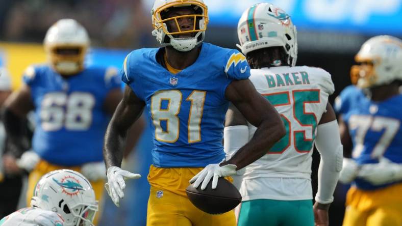 Sep 10, 2023; Inglewood, California, USA; Los Angeles Chargers wide receiver Mike Williams (81) reacts after a first down against the Miami Dolphins in the second half at SoFi Stadium. Mandatory Credit: Kirby Lee-USA TODAY Sports