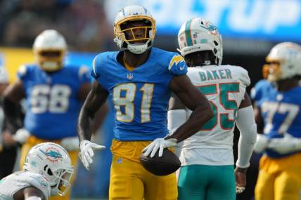 Sep 10, 2023; Inglewood, California, USA; Los Angeles Chargers wide receiver Mike Williams (81) reacts after a first down against the Miami Dolphins in the second half at SoFi Stadium. Mandatory Credit: Kirby Lee-USA TODAY Sports