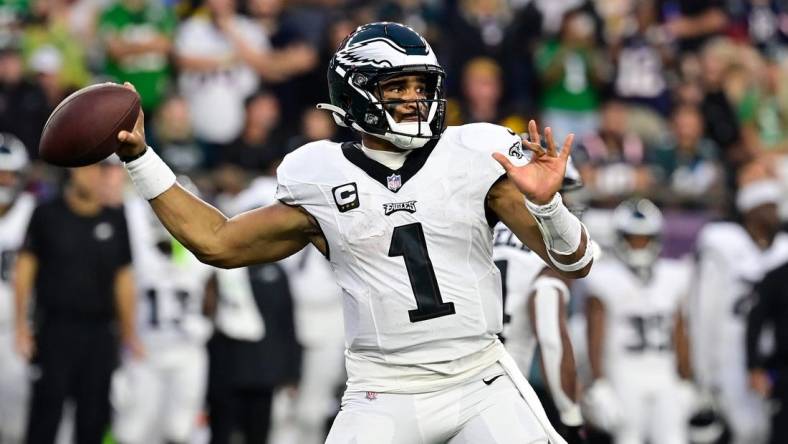 Sep 10, 2023; Foxborough, Massachusetts, USA; Philadelphia Eagles quarterback Jalen Hurts (1) throws a pass against the New England Patriots during the second half at Gillette Stadium. Mandatory Credit: Eric Canha-USA TODAY Sports