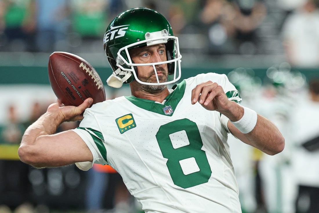 Sep 11, 2023; East Rutherford, New Jersey, USA; New York Jets quarterback Aaron Rodgers (8) warms up before the game against the Buffalo Bills at MetLife Stadium. Mandatory Credit: Vincent Carchietta-USA TODAY Sports