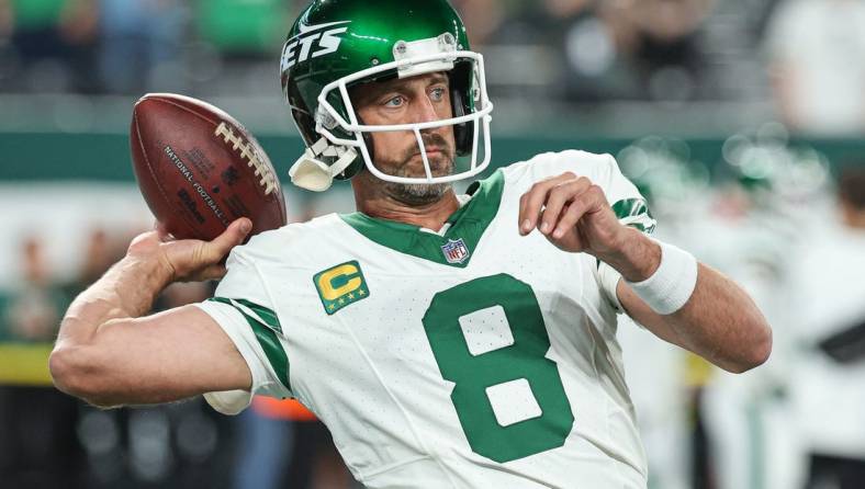 Sep 11, 2023; East Rutherford, New Jersey, USA; New York Jets quarterback Aaron Rodgers (8) warms up before the game against the Buffalo Bills at MetLife Stadium. Mandatory Credit: Vincent Carchietta-USA TODAY Sports