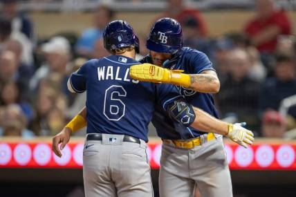Sep 11, 2023; Minneapolis, Minnesota, USA; Tampa Bay Rays shortstop Taylor Walls (6) celebrates with center fielder Jose Siri (22) after hitting a three run home run against the Minnesota Twins in the fifth inning at Target Field. Mandatory Credit: Jesse Johnson-USA TODAY Sports
