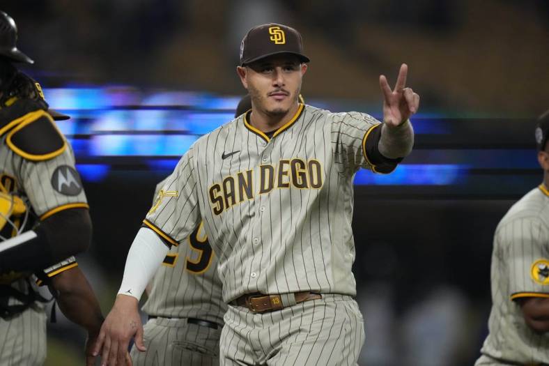 Sep 11, 2023; Los Angeles, California, USA; San Diego Padres third baseman Manny Machado (13) reacts at the end of the game against the Los Angeles Dodgers at Dodger Stadium. Mandatory Credit: Kirby Lee-USA TODAY Sports