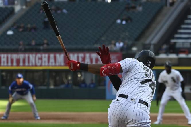 Sep 12, 2023; Chicago, Illinois, USA;  Chicago White Sox designated hitter Eloy Jimenez (74) hits an RBI single against the Kansas City Royals during the first inning at Guaranteed Rate Field. Mandatory Credit: Matt Marton-USA TODAY Sports