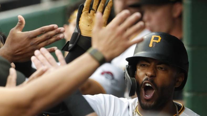 Sep 12, 2023; Pittsburgh, Pennsylvania, USA; Pittsburgh Pirates right fielder Joshua Palacios (54) receives high-fives in the dugout after hitting a two run home run against the Washington Nationals during the second inning at PNC Park. Mandatory Credit: Charles LeClaire-USA TODAY Sports