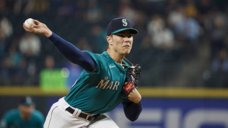 Sep 12, 2023; Seattle, Washington, USA; Seattle Mariners starting pitcher Bryan Woo (33) throws against the Los Angeles Angels during the first inning at T-Mobile Park. Mandatory Credit: Joe Nicholson-USA TODAY Sports