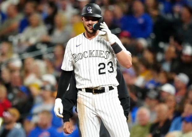 Sep 12, 2023; Denver, Colorado, USA; Colorado Rockies right fielder Kris Bryant (23) reacts to his RBI single in the fifth inning against the Colorado Rockies at Coors Field. Mandatory Credit: Ron Chenoy-USA TODAY Sports