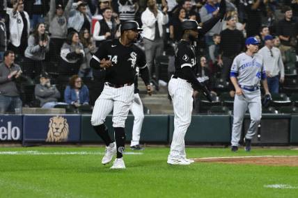 Sep 12, 2023; Chicago, Illinois, USA; Chicago White Sox designated hitter Eloy Jimenez (74) scores against the Kansas City Royals during the sixth inning at Guaranteed Rate Field. Mandatory Credit: Matt Marton-USA TODAY Sports