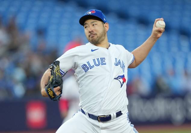 Sep 13, 2023; Toronto, Ontario, CAN; Toronto Blue Jays starting pitcher Yusei Kikuchi (16) throws a pitch against the Texas Rangers during the first inning at Rogers Centre. Mandatory Credit: Nick Turchiaro-USA TODAY Sports