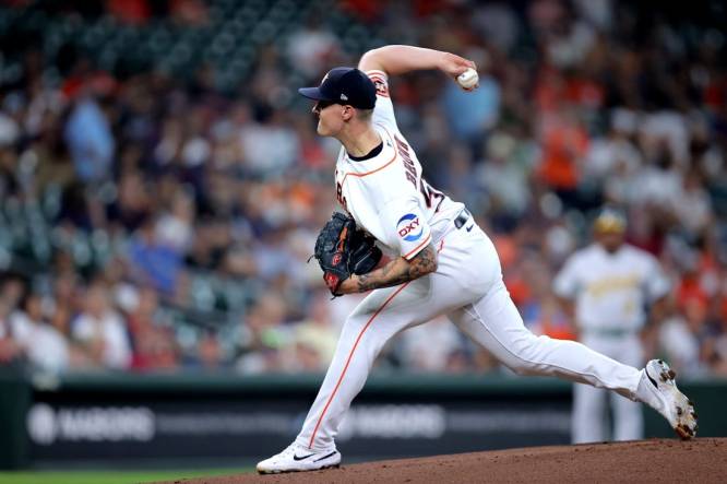 Sep 13, 2023; Houston, Texas, USA; Houston Astros starting pitcher Hunter Brown (58) delivers a pitch against the Oakland Athletics during the first inning at Minute Maid Park. Mandatory Credit: Erik Williams-USA TODAY Sports