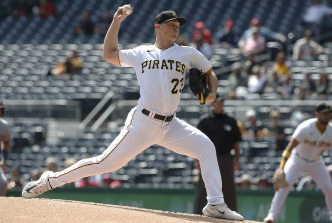 Sep 14, 2023; Pittsburgh, Pennsylvania, USA; Pittsburgh Pirates starting pitcher Mitch Keller (23) delivers a pitch against the Washington Nationals during the first inning at PNC Park. Mandatory Credit: Charles LeClaire-USA TODAY Sports