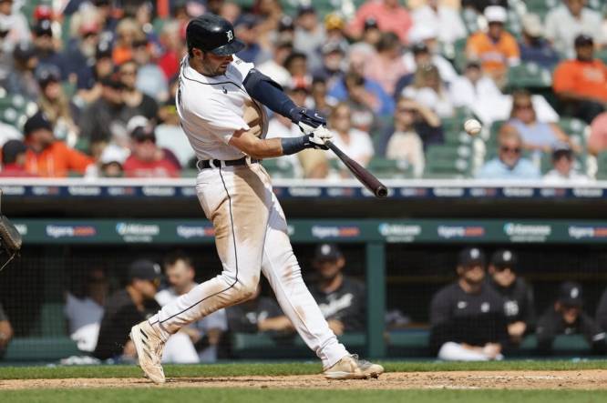 Sep 14, 2023; Detroit, Michigan, USA; Detroit Tigers right fielder Matt Vierling (8) hits a grand slam in the eighth inning against the Cincinnati Reds at Comerica Park. Mandatory Credit: Rick Osentoski-USA TODAY Sports