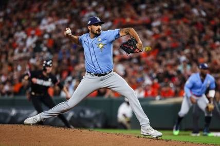 Sep 15, 2023; Baltimore, Maryland, USA; Tampa Bay Rays starting pitcher Zach Eflin (24) pitches against the Baltimore Orioles during the first inning at Oriole Park at Camden Yards. Mandatory Credit: Scott Taetsch-USA TODAY Sports