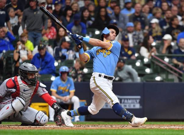 Sep 15, 2023; Milwaukee, Wisconsin, USA; Milwaukee Brewers outfielder Sal Frelick (10) misses as he swings a pitch against the Washington Nationals in the fourth inning at American Family Field. Mandatory Credit: Michael McLoone-USA TODAY Sports
