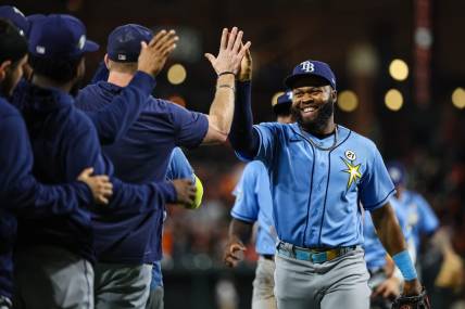 Sep 15, 2023; Baltimore, Maryland, USA; Tampa Bay Rays center fielder Manuel Margot (13) celebrates with teammates after the game against the Baltimore Orioles at Oriole Park at Camden Yards. Mandatory Credit: Scott Taetsch-USA TODAY Sports