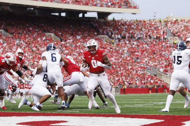 Sep 16, 2023; Madison, Wisconsin, USA;  Wisconsin Badgers running back Braelon Allen (0) rushes for a touchdown during the third quarter against the Georgia Southern Eagles at Camp Randall Stadium. Mandatory Credit: Jeff Hanisch-USA TODAY Sports
