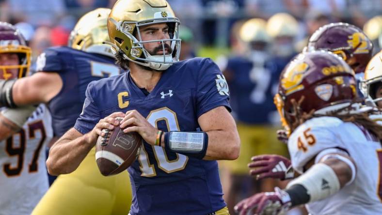 Sep 16, 2023; South Bend, Indiana, USA; Notre Dame Fighting Irish quarterback Sam Hartman (10) throws in the third quarter against the Central Michigan Chippewas at Notre Dame Stadium. Mandatory Credit: Matt Cashore-USA TODAY Sports