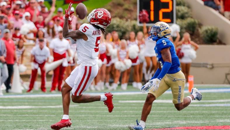 Sep 16, 2023; Tulsa, Oklahoma, USA; Oklahoma's Andrel Anthony (5) catches a pass for a first down in the first quarter against the Tulsa Golden Hurricane at Skelly Field at H.A. Chapman Stadium. Mandatory Credit: Nathan J. Fish-USA TODAY Sports