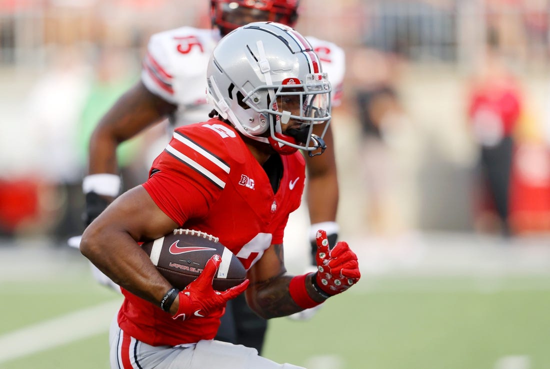 Sep 16, 2023; Columbus, Ohio, USA; Ohio State Buckeyes wide receiver Emeka Egbuka (2) runs for a touchdown during the second quarter against the Western Kentucky Hilltoppers at Ohio Stadium. Mandatory Credit: Joseph Maiorana-USA TODAY Sports