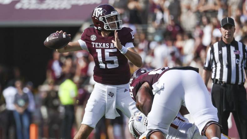 Sep 16, 2023; College Station, Texas, USA; Texas A&M Aggies quarterback Conner Weigman (15) attempts a pass during the second quarter against the Louisiana Monroe Warhawks at Kyle Field. Mandatory Credit: Troy Taormina-USA TODAY Sports