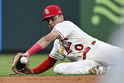 Sep 16, 2023; St. Louis, Missouri, USA;  St. Louis Cardinals shortstop Masyn Winn (0) knocks down a ground ball against the Philadelphia Phillies during the second inning at Busch Stadium. Mandatory Credit: Jeff Curry-USA TODAY Sports