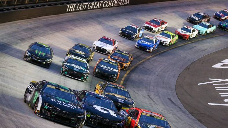 Sep 16, 2023; Bristol, Tennessee, USA; NASCAR Cup Series driver William Byron (24) and driver Martin Truex Jr. (19) and driver Alex Bowman (48) during the Bass Pro Shops Night Race at Bristol Motor Speedway. Mandatory Credit: Randy Sartin-USA TODAY Sports